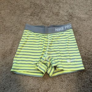 Yellow and grey Nike Spandex